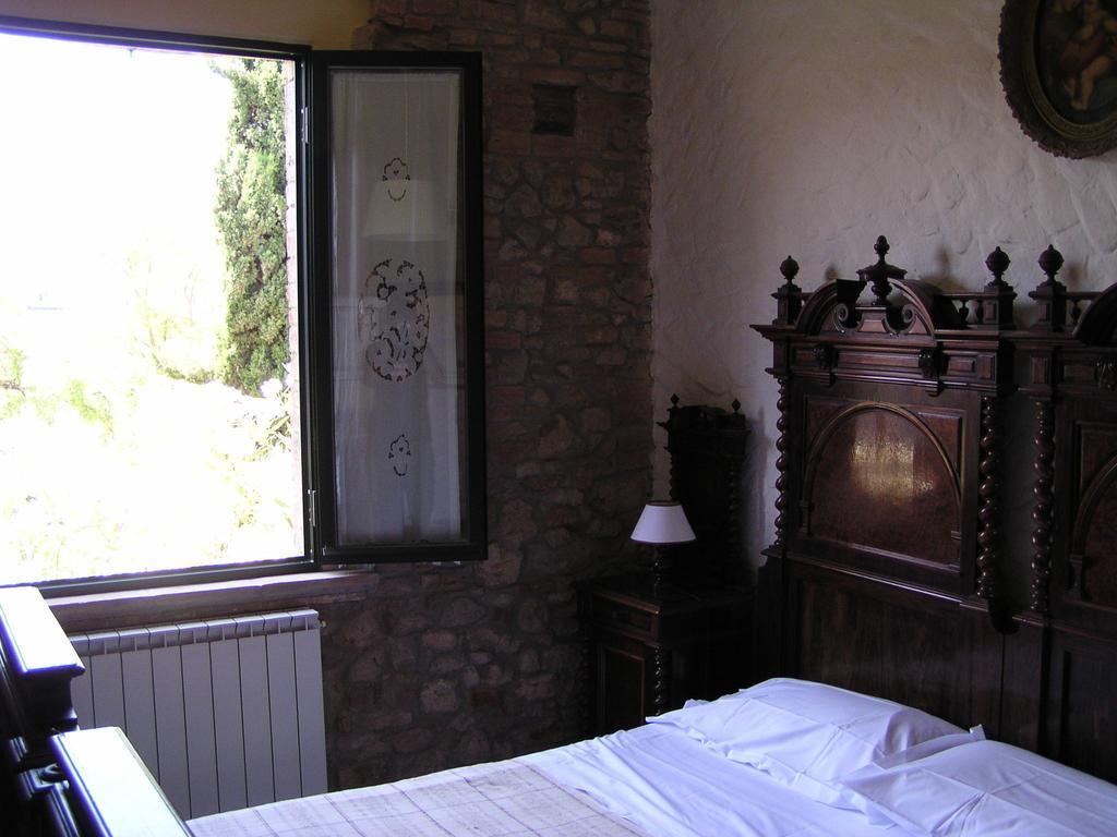 Agriturismo Santa Croce Сан Джиминяно Стая снимка